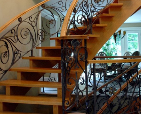 luxury staircase with wooden stairs and steel custom railings decor