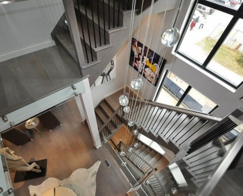 luxury staircase with steel railings