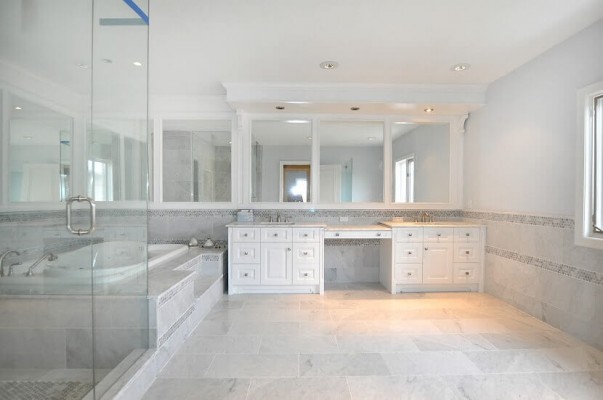 luxury white bathroom with shower and bathtub